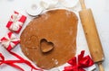 8 march, Valentine`s day, mother`s day baking culinary background, cooking recipe. gingerbread cookies on kitchen table Royalty Free Stock Photo