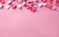 Valentine's Day paper hearts on a pink background with copy space