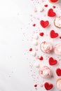 Valentine's Day party with heart-shaped decorations, confetti, and cupcakes Royalty Free Stock Photo