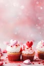 Valentine's Day party with heart-shaped decorations, confetti, and cupcakes Royalty Free Stock Photo