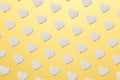 Valentine`s Day postcard. Valentine`s Day Background. Trendy pattern made with paper hearts on bright light yellow background