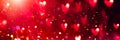 Valentine`s Day red Background. Holiday Blinking Abstract Valentine Backdrop with Glowing Hearts. Heart Shape Bokeh Royalty Free Stock Photo