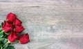 Valentine`s Day Red Roses Over Wood Background