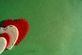 Valentine`s day red and white hearts on a green background symbol of love Royalty Free Stock Photo