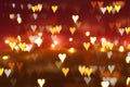 Valentine's day romantic glitter bokeh background with many hearts lights. Royalty Free Stock Photo