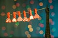 Valentine`s Day, romantic still life, hearts hanging on a clothespin on the Eiffel Tower, on a blurred background, bokeh Royalty Free Stock Photo