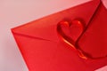 Valentine`s Day of St.Valentine Day envelope and ribbon of red color heart shape from a ribbon Royalty Free Stock Photo