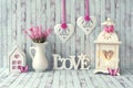 Vintage decor for Valentine\'s Day. Two hearts, a lantern and the word Love Royalty Free Stock Photo