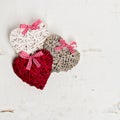 Valentine's day. Vintage style. Three hearts on old white wooden