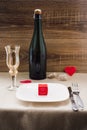 Valentine`s Day. wine, candles, small heart Royalty Free Stock Photo