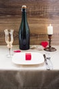 Valentine`s Day. wine, candles, small heart Royalty Free Stock Photo