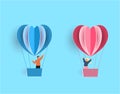 Valentine s Day. A young joyful couple flies in the shape of hearts in balloons. illustration