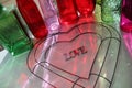 Valentine's love, wire heart, colorful reflections from glass bottles LOVE REFLECTS Royalty Free Stock Photo