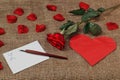 Valentine still life with red heart and red rose Royalty Free Stock Photo