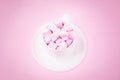 Valentine's day background with pink marshmallow hearts in a cup Royalty Free Stock Photo