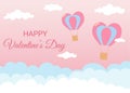 Valentine's Day greeting card. Air balloons in heart shape flying in the sky. Pink background with white and blue clouds Royalty Free Stock Photo