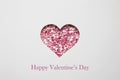 valentine's day greeting card is cut out of paper in the shape of a heart. happy Valentine's