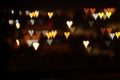 Valentine& x27;s day romantic glitter bokeh background with many hearts lights. Royalty Free Stock Photo