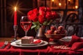 Romantic table setting with roses, candles and wine.