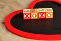 Valentine's Day. XOXO Spelled with colorful alphabet blocks Royalty Free Stock Photo