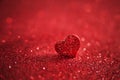 Valentines bright red heart on a red glitter background. Royalty Free Stock Photo