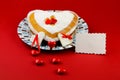 Valentines cake on the red background