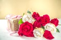 Gift box and roses background Royalty Free Stock Photo