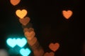 Valentines Colorful heart-shaped on black background lighting bokeh for decoration at night backdrop wallpaper blurred valentine