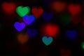 Valentines Colorful heart-shaped bokeh on black background lighting bokeh for decoration at night wallpaper valentine