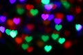 Valentines Colorful heart-shaped bokeh on black background lighting bokeh for decoration at night wallpaper blur valentine