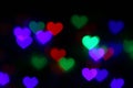 Valentines Colorful heart-shaped bokeh on black background lighting bokeh for decoration at night wallpaper valentine