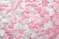 Valentines Day abstract background texture from textile silk or satin hearts. Pink, red and white heart shape backdrop. Greeting c Royalty Free Stock Photo