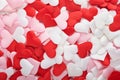 Valentines Day abstract background texture from textile silk or satin hearts. Pink, red and white heart shape backdrop. Greeting Royalty Free Stock Photo