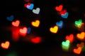Valentines day abstract defocused bokeh background.Hearts and circles bokeh lights. Romantic blurred texture.Love concept Royalty Free Stock Photo