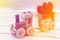 Valentines day background symbol. Two heart in toy train. Concept of love Royalty Free Stock Photo