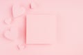 Valentines day background with blank page and paper hearts on gentle pink color background. Royalty Free Stock Photo