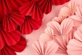 Valentines day background - border of heap pink and red paper ribbed hearts on soft light pastel pink color as bright passion.