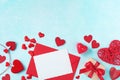 Valentines day background. Envelope, greeting card, gift box and red hearts for holiday message