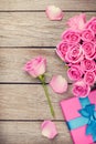 Valentines day background with gift box full of pink roses Royalty Free Stock Photo