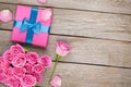 Valentines day background with gift box full of pink roses Royalty Free Stock Photo