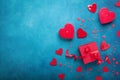 Valentines day background with gift box and red hearts. Top view. Flat lay style. Royalty Free Stock Photo