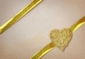 Valentines day background, golden heart made of beads, gold rib Royalty Free Stock Photo