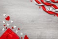 Valentines Day background. Hand made hearts and red giftboxes on wooden background Royalty Free Stock Photo