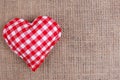 Valentines Day background. Handmade checkered fabric heart on sa Royalty Free Stock Photo