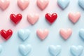 Valentines Day background with many small paper hearts in pastel colors