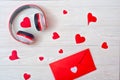 Valentines Day background with a red envelope and headphones.Romantic music about love.