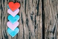 Valentines day background with red hearts over grunge wooden tab Royalty Free Stock Photo