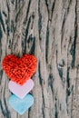 Valentines day background with red hearts over grunge wooden tab Royalty Free Stock Photo