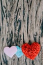 Valentines day background with red hearts over grunge wooden tab Royalty Free Stock Photo