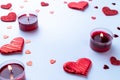 Valentines day background: red love hearts, romantic gift box, candle on white table. February romance present card Royalty Free Stock Photo
